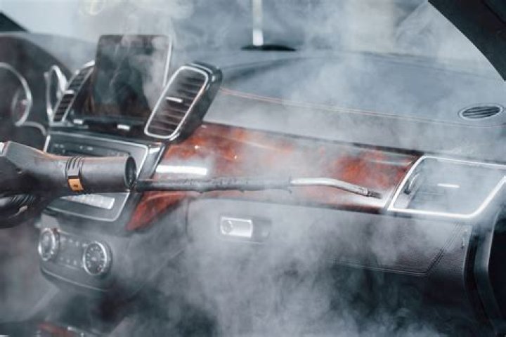 how to get cigarette smoke off inside car windshield?